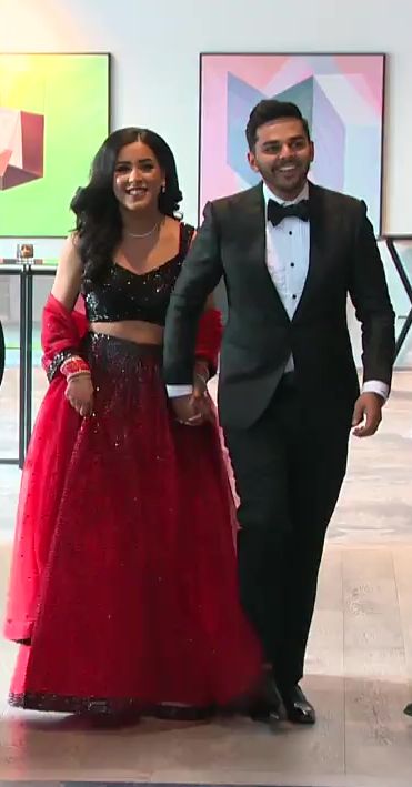 Edmonton Oilers fan Jasin Dhaliwal and Calgary Flames fan Manika Chopra-Dhaliwal had their wedding reception overlooking Ice District Plaza Sunday, May 22, 2022.