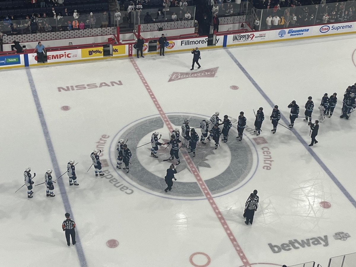The Manitoba Moose and Milwaukee Admirals shake hands after their first round playoff series at Canada Life center in Winnipeg.