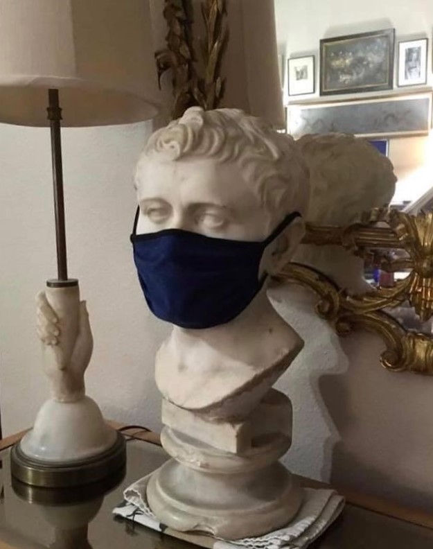 The bust wears a mask while on display in Young's home.