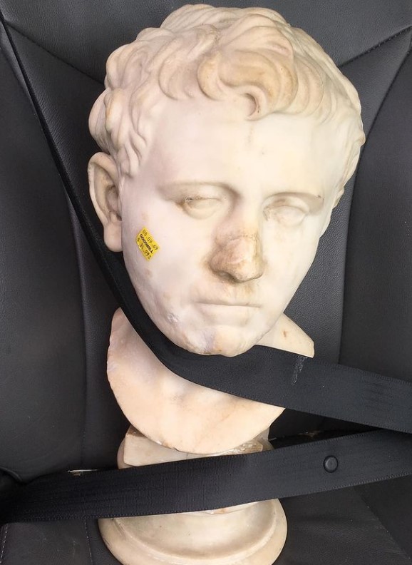 Safety first for the bust, which Young strapped in with a seatbelt on her way home from the Goodwill.