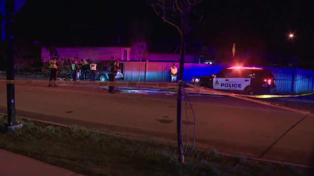 Police investigate after a car crashed into the side of a home along Silver Berry Road between 29 Street and 28A Avenue in southeast Edmonton Thursday, May 26, 2022.