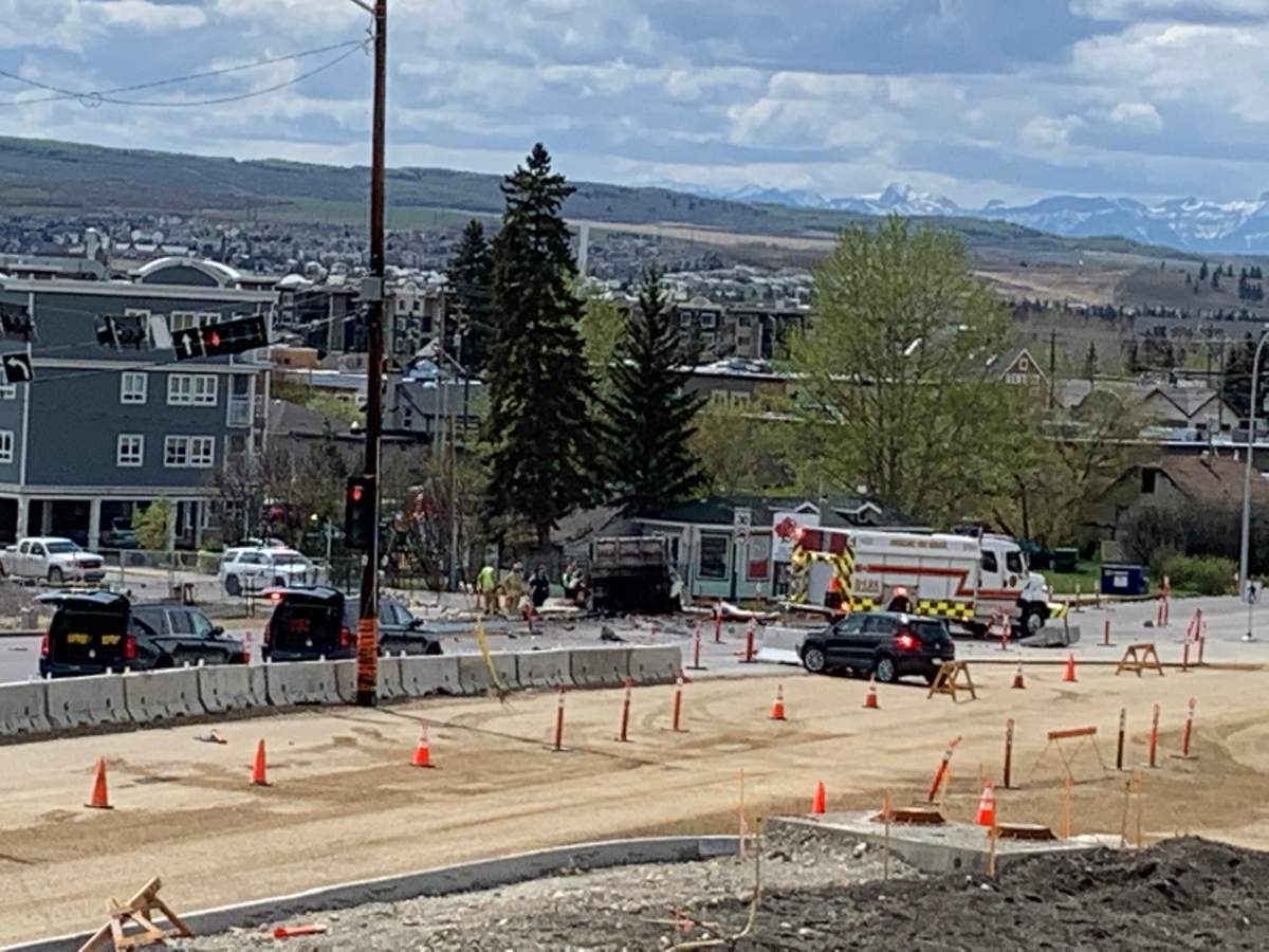 RCMP investigate a collision on Highway 1A at Center Avenue in Cochrane, Alta., Tuesday, May 24, 2022.