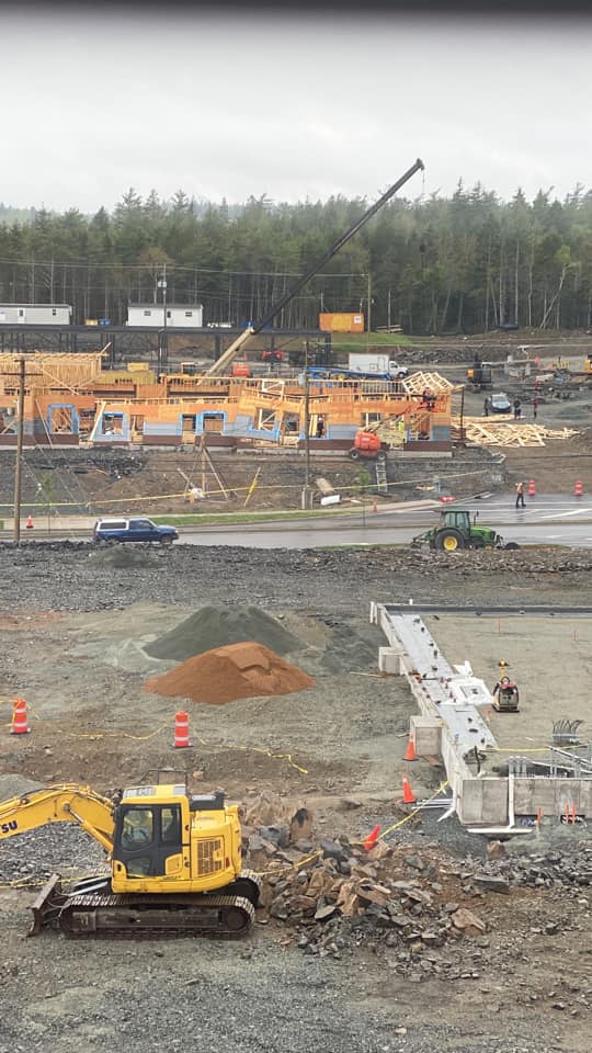 Workers appeared to be cleaning up part of the roof Monday.