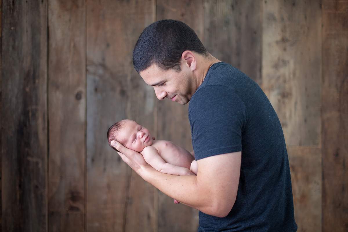 father with newborn