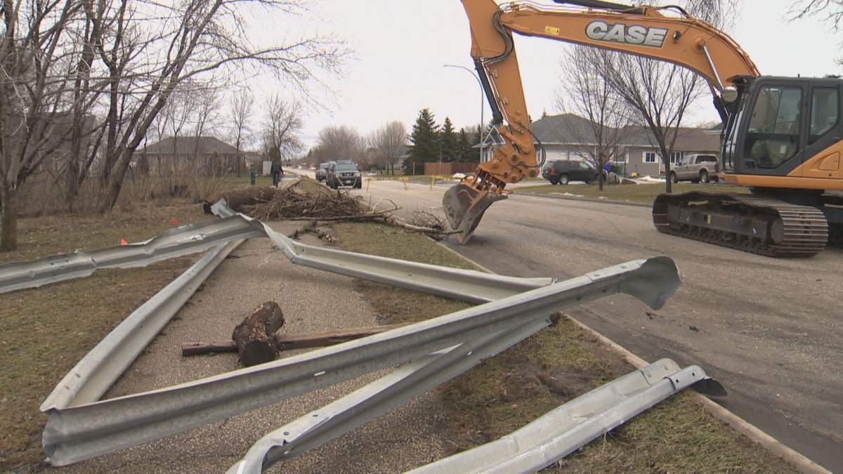 The aftermath of the flooding on Parkhill Drive in Morden, Man. on Sunday. 