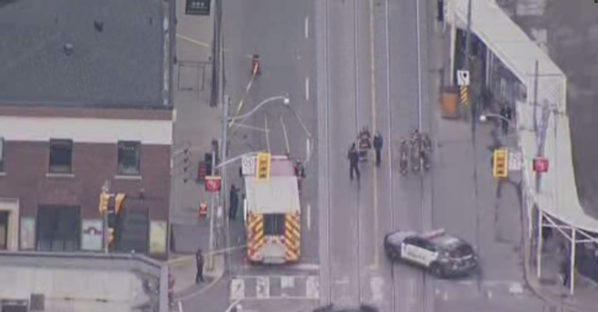Toronto police say a building in Toronto has been evacuated after a "suspicious item" was thrown through the window.