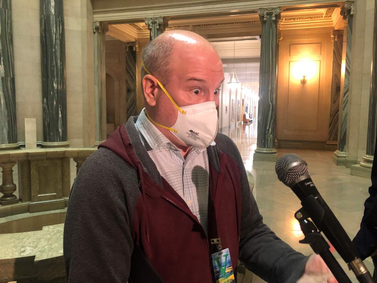 Regina resident Frank Francouer speaks to reporters about his experience on the Saskatchewan Income Support Program. 