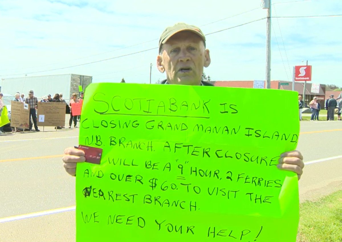 Gregg Russell organized Friday’s protest in front of Scotiabank on Grand Manan island.