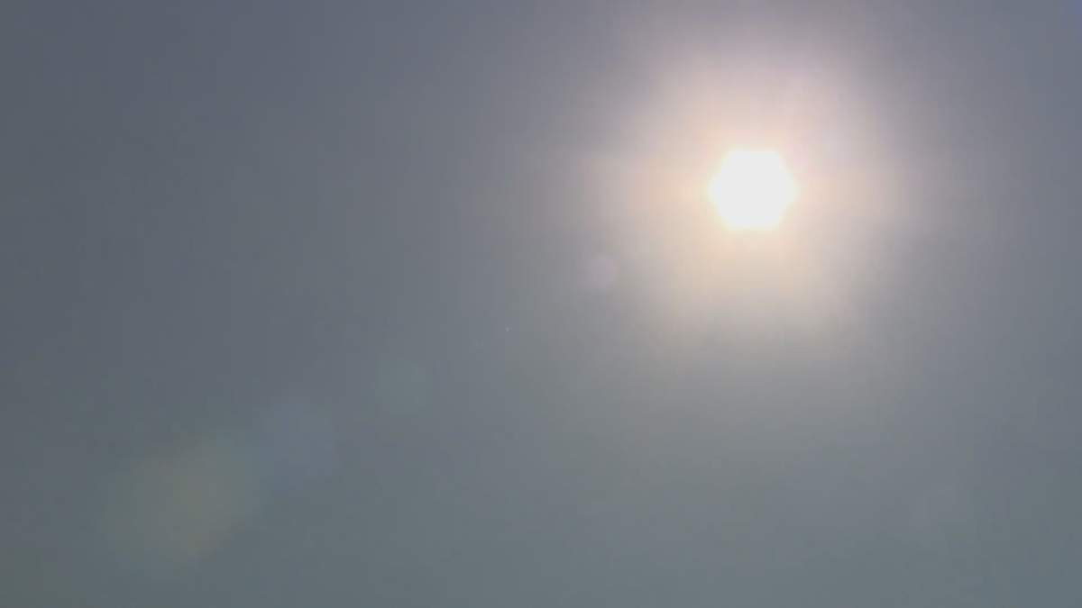 The sun high in the sky.