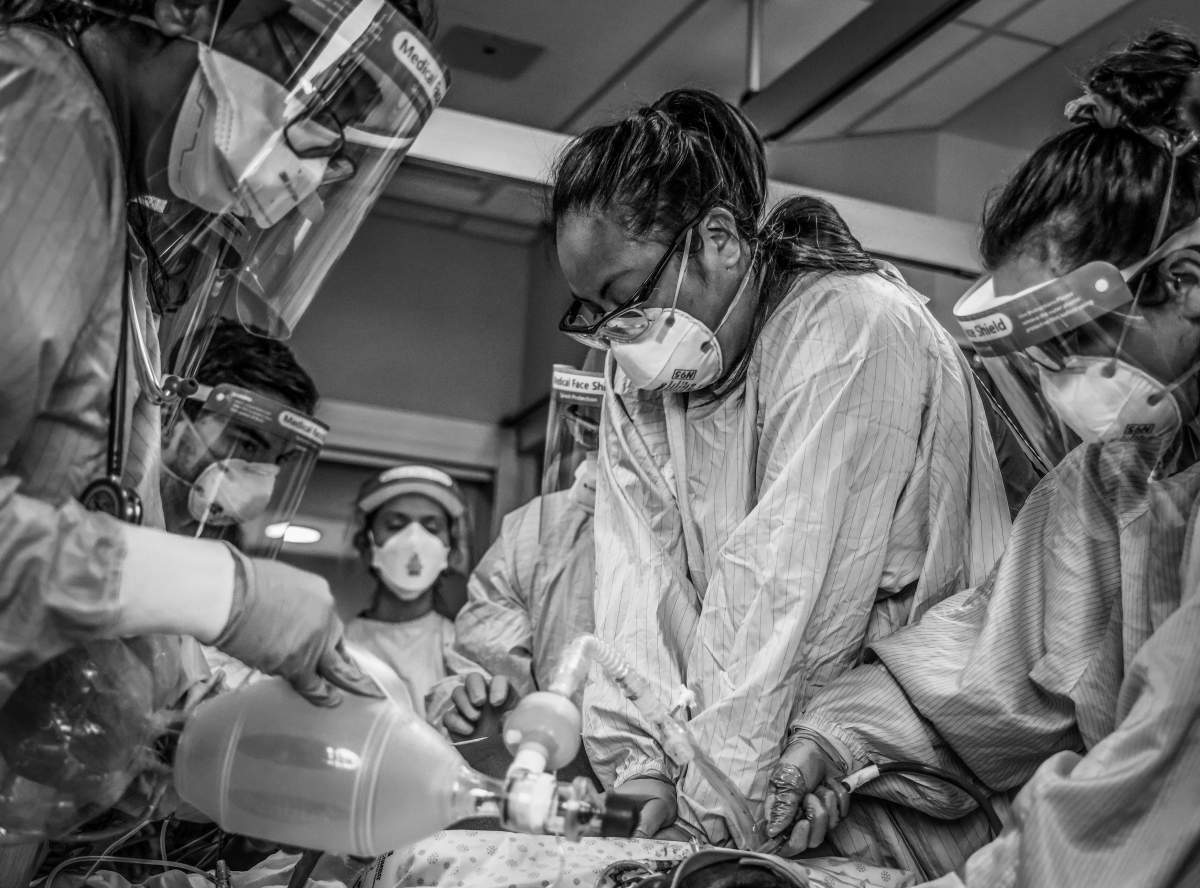 Mia Torres and her colleagues working on a patient.