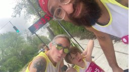 Ben and Kami Crawford are pictured with their son, Rainier, during the Flying Pigs Marathon.