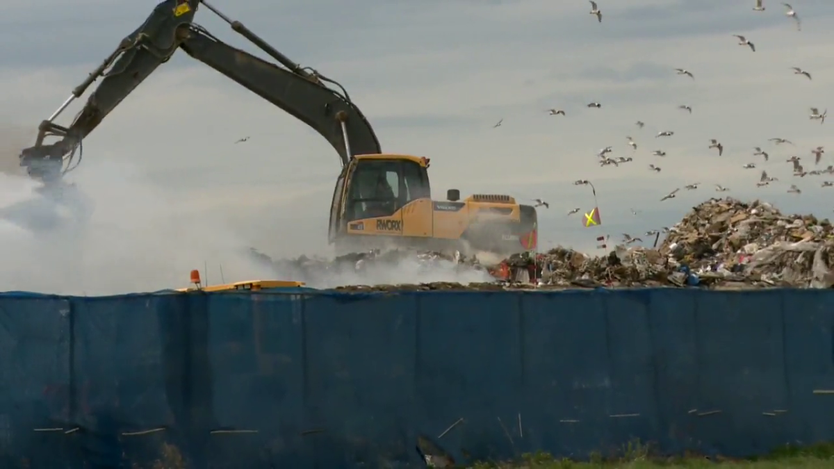 Officials arrived on scene of a fire at a recycling plant east of Calgary Sunday, May 29, 2022.