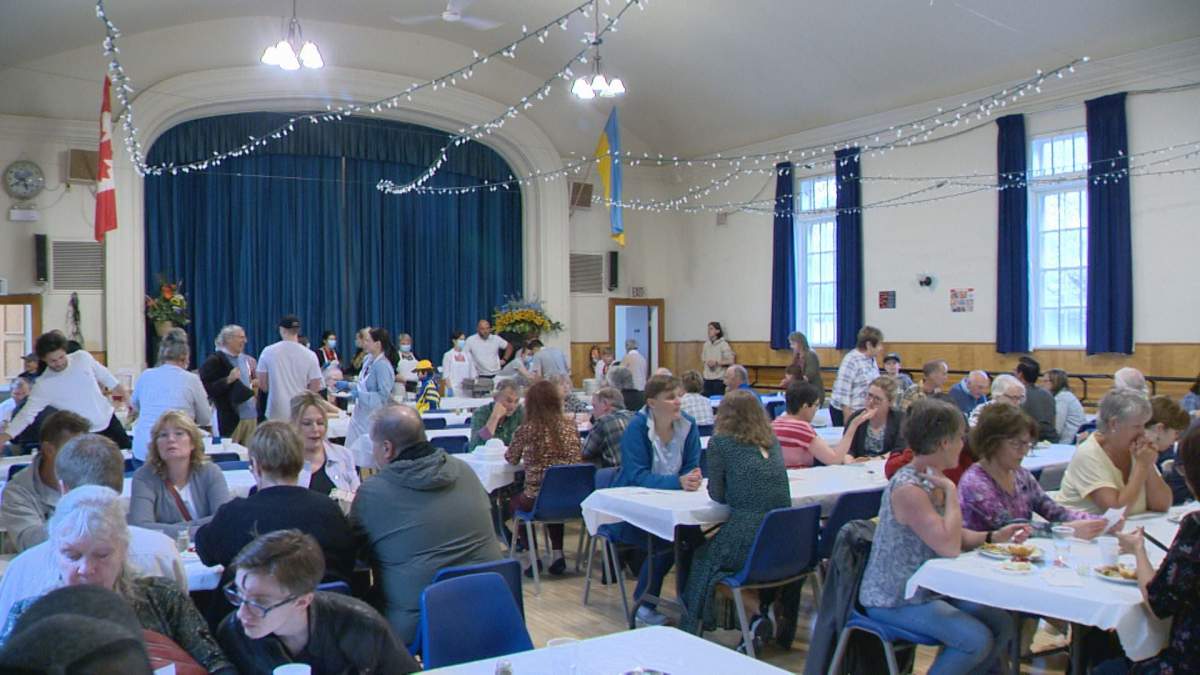 Regina residents gather to raise money for displaced Ukrainians who have fled the war.
