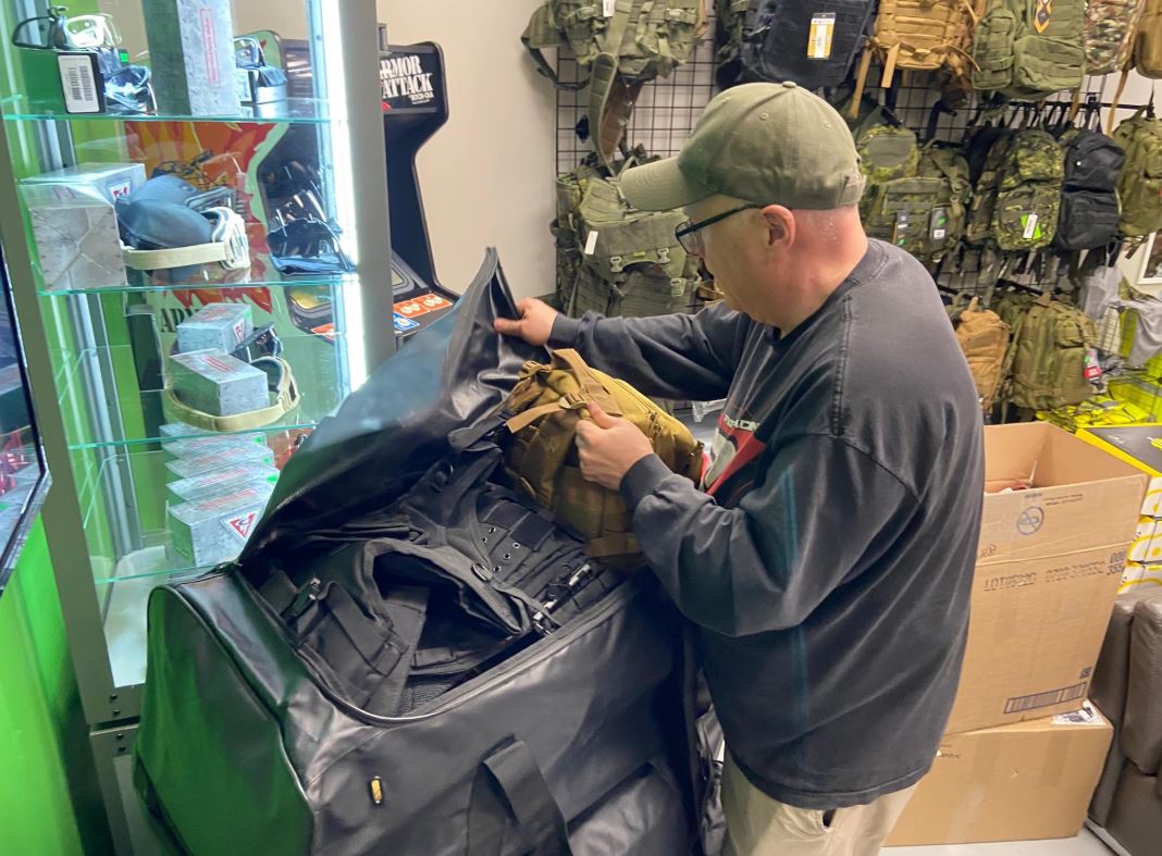 Dave Bryenton packing supplies for Ukraine in Edmonton on May 10, 2022.