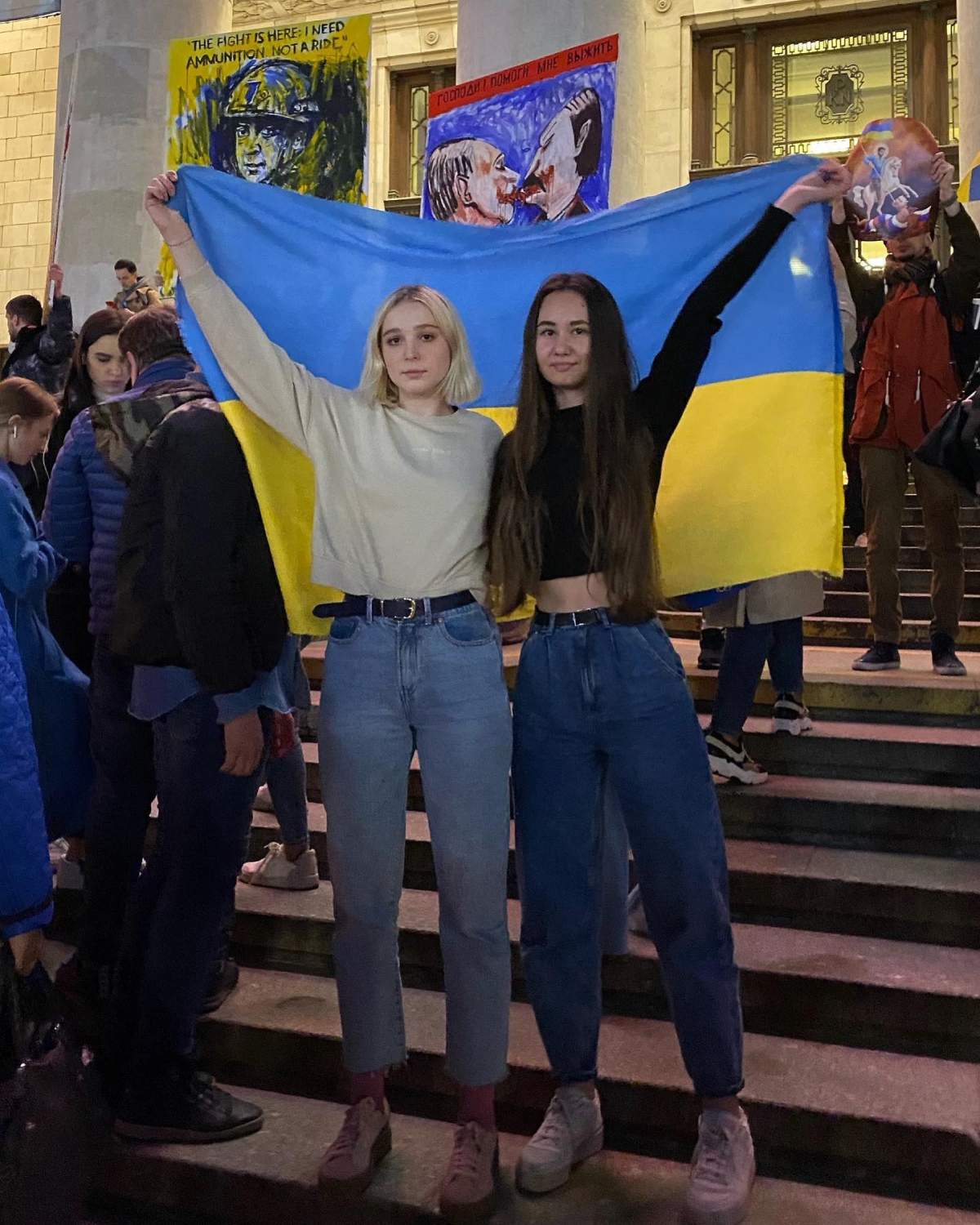Viktoria Mazurak (right) with a friend at an anti war rally in Warsaw, Poland.