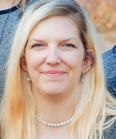 Family members identified the victim as Angela McKenzie, a single mother of five.