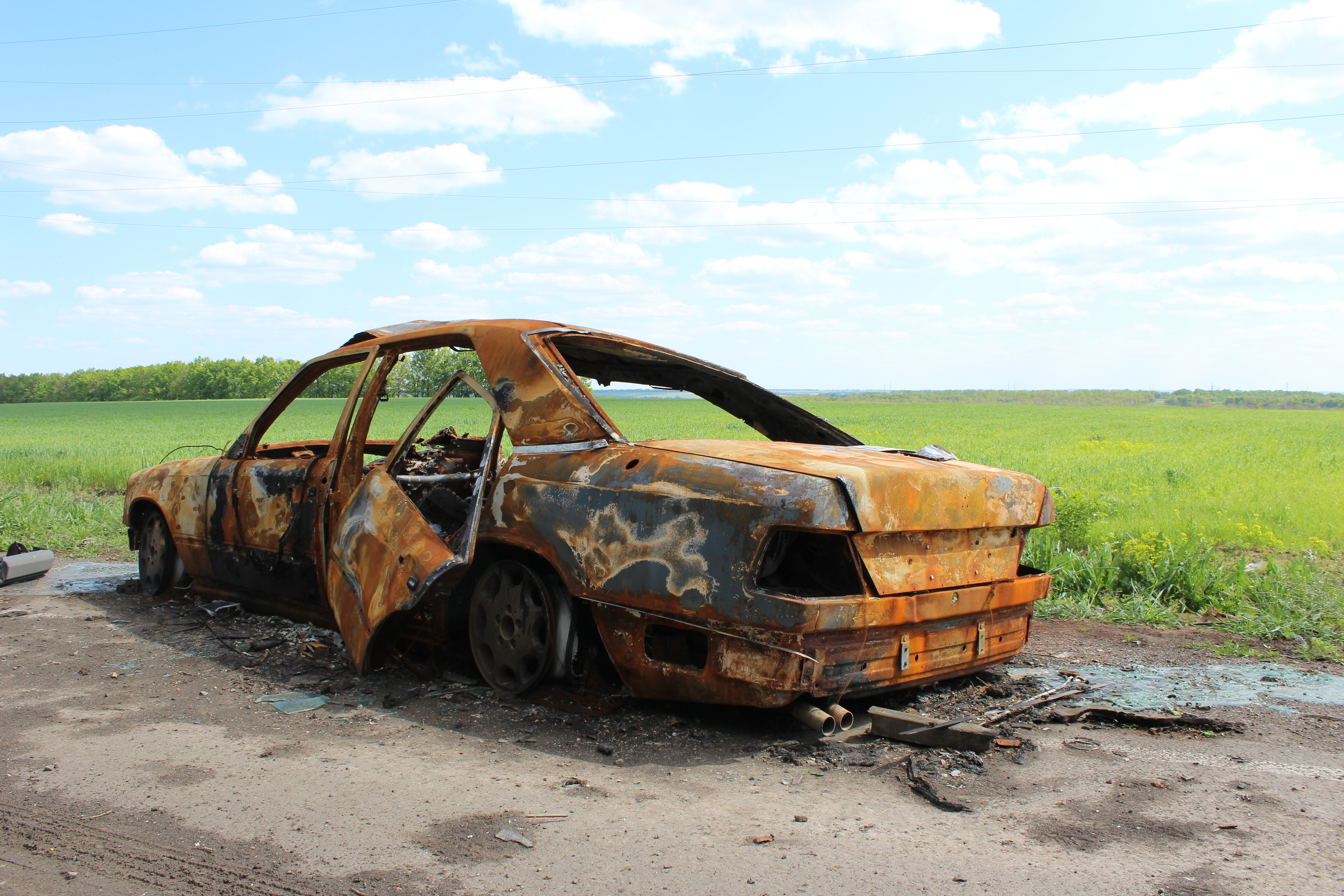 A vehicle that was hit by a Russian tank shell at the roadside near Mala Rohan, Ukraine. May 23, 2022.