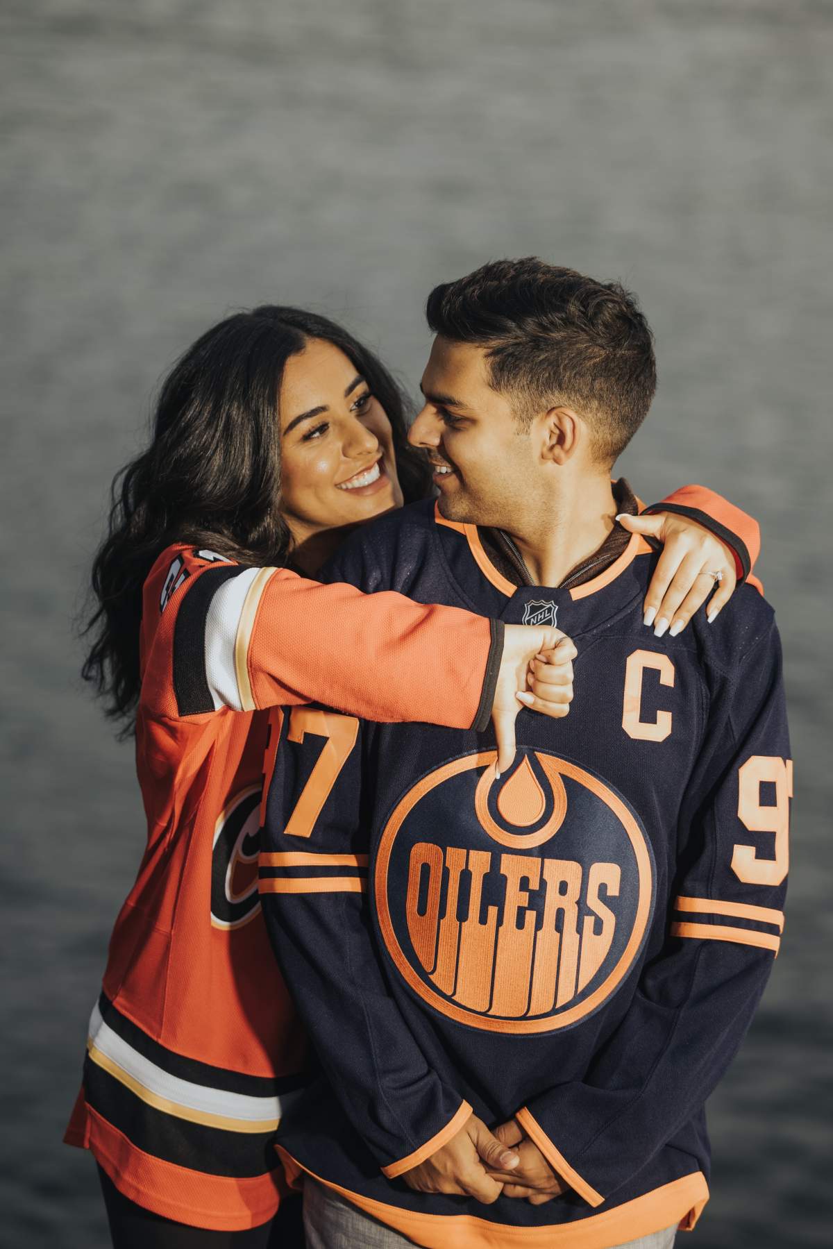Edmonton Oilers fan Jasin Dhaliwal and Calgary Flames fan Manika Chopra-Dhaliwal had their wedding reception overlooking Ice District Plaza Sunday, May 22, 2022.