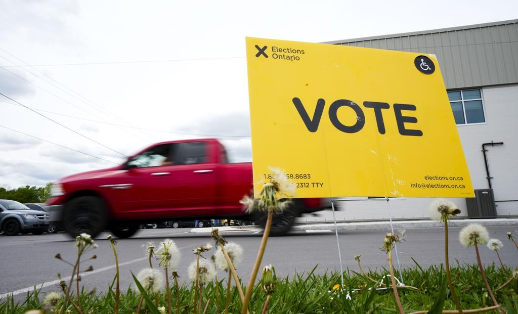A vote sign is displayed outside a polling station during advanced voting in the Ontario provincial election in Carleton Place, Ont., on Tuesday, May 24, 2022. 