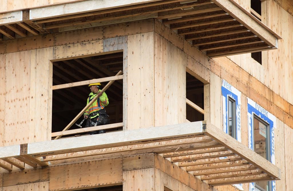 A worker is seen working on a construction project in Vancouver on April 23, 2019.  