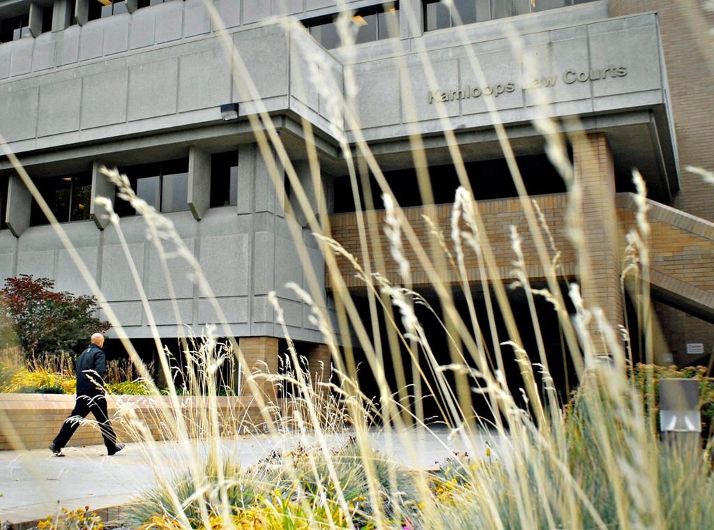 A man leaves the Kamloops Law Courts building, in Kamloops, BC on Tuesday, Oct. 13, 2009. A family court pilot project in British Columbia may be a promising solution for domestic violence victims trying to navigate a confusing and intimidating legal system, advocates say. THE CANADIAN PRESS/ Daniel Hayduk.