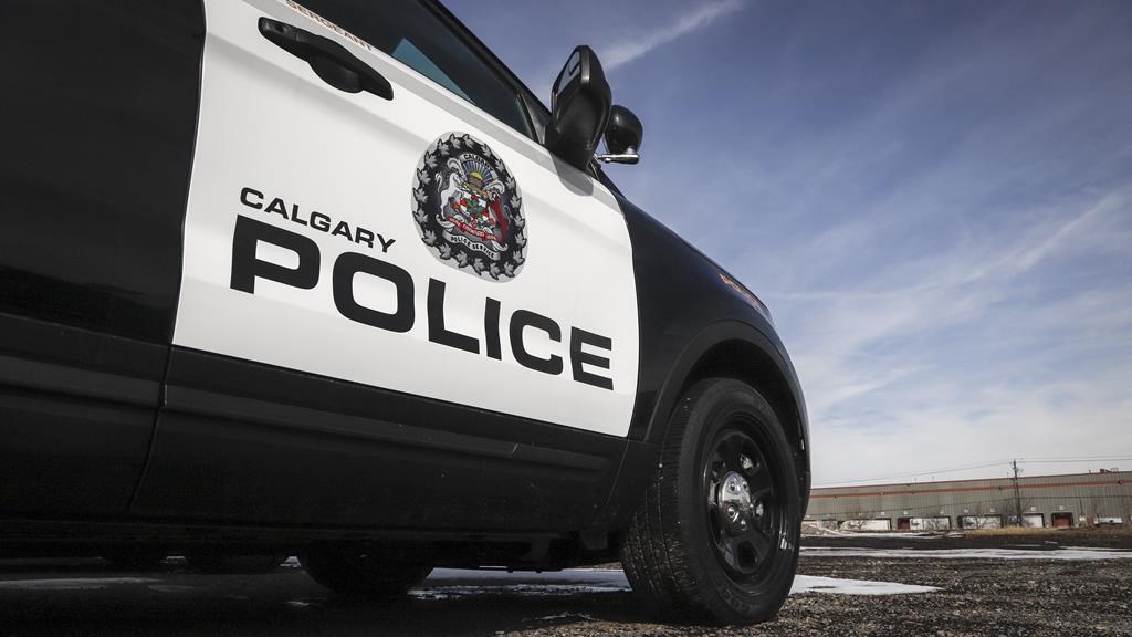 Police vehicles are shown at Calgary Police Service headquarters in Calgary, on April 9, 2020.