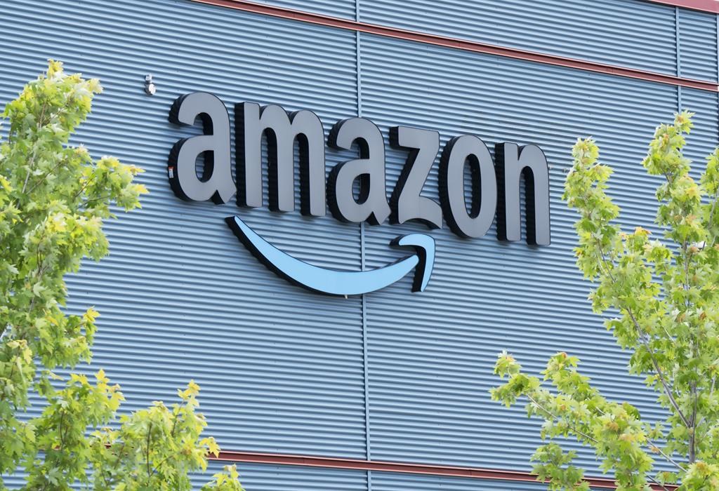 Signage on an Amazon warehouse is seen Wednesday, June 8, 2022, in Montreal. 