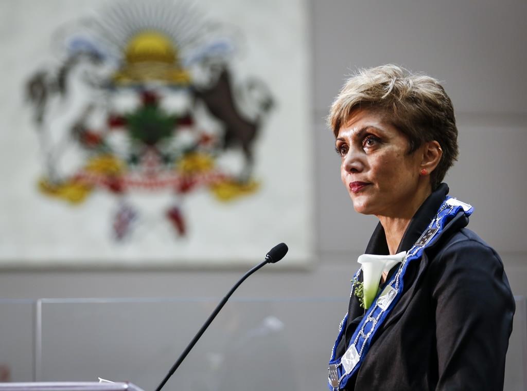 Jyoti Gondek speaks to the media after being sworn-in as the new mayor of Calgary in Calgary, Alta., Monday, Oct. 25, 2021. Gondek said she is opposed to Alberta's controversial Sovereignty Act, saying it will strip autonomy from the municipal government.