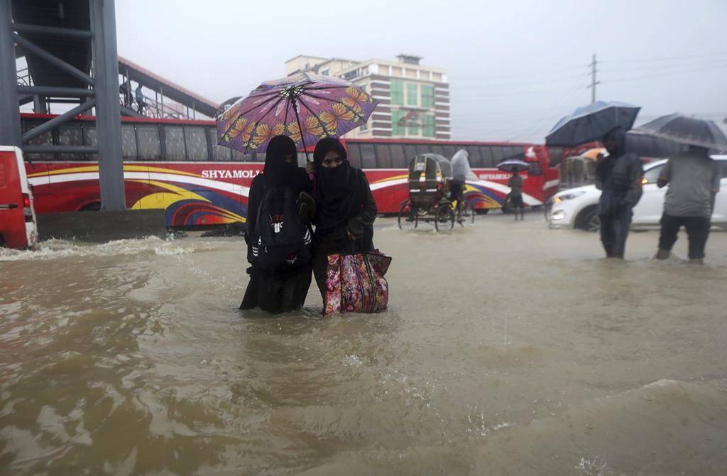 At least 18 dead, millions stranded as floods ravage India, Bangladesh