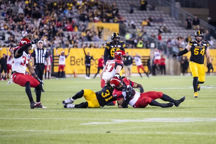 Stampeders defeat Tiger-Cats in overtime at home opener