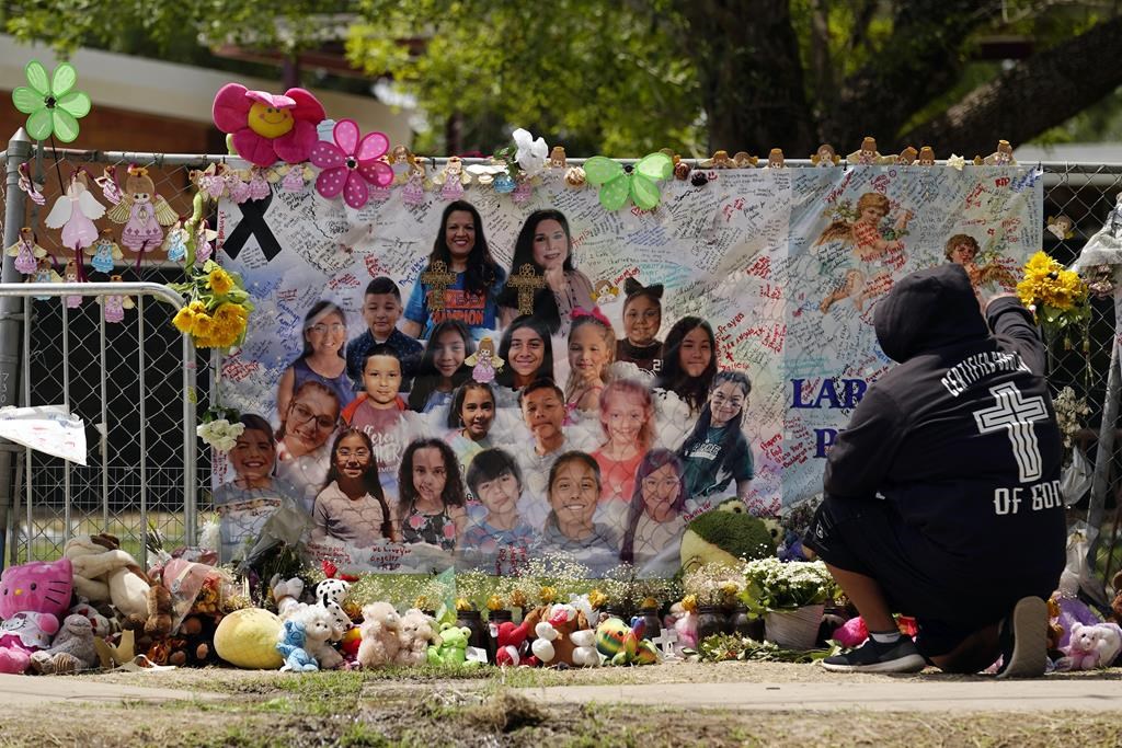 Photo of a memorial for Uvalde school shooting victims