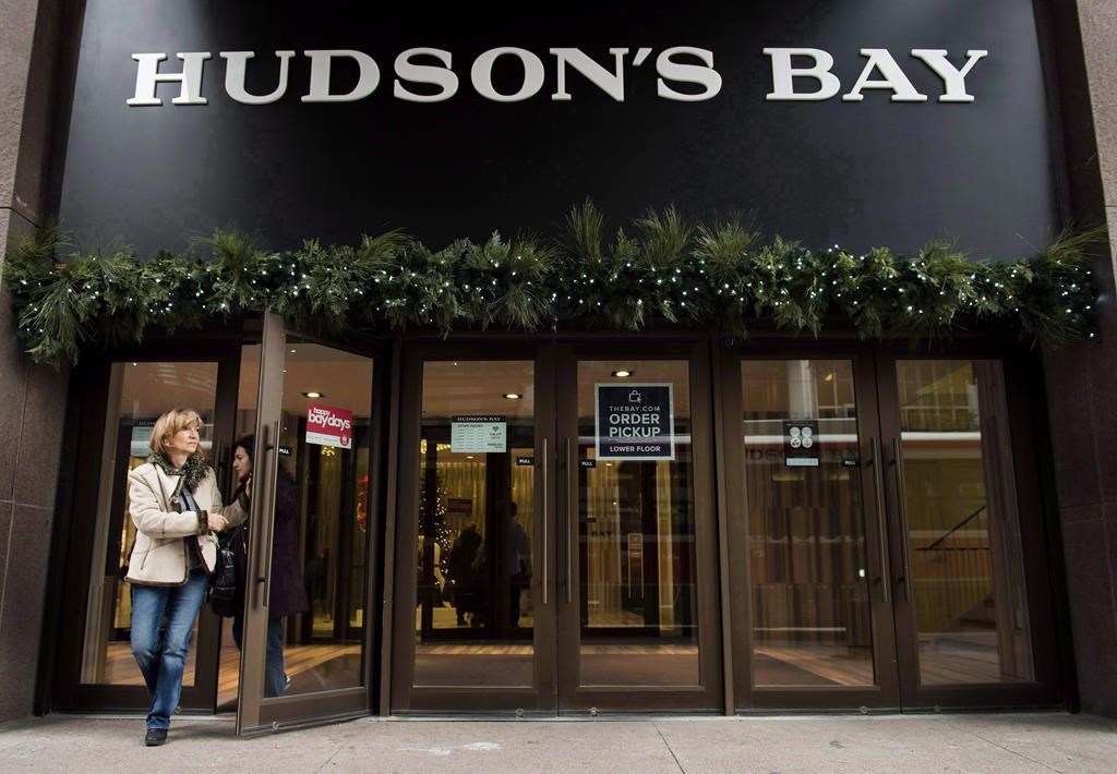 A women leaves the Hudson Bay Company store in Toronto on November 1, 2017. 
