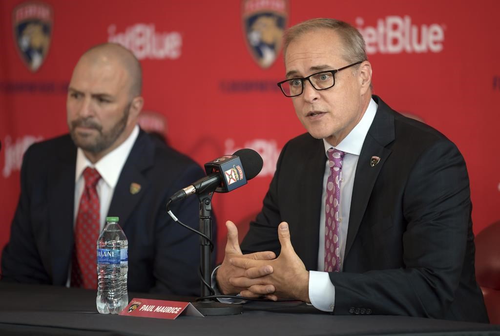 Paul Maurice, right, new head coach of the Florida Panthers, and general manager Bill Zito take questions during an NHL hockey news conference at FLA Live Arena, Thursday, June 23, 2022, in Sunrise, Fla.