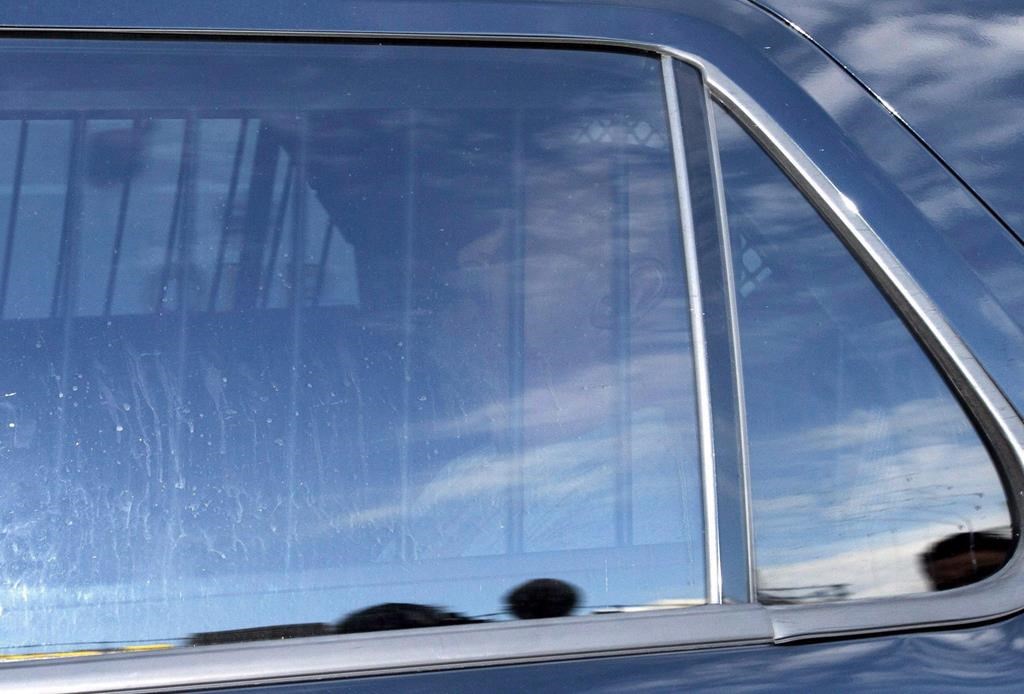 Basil Borutski arrives in a police vehicle for an appearance at the courthouse in Pembroke, Ont., on September 23, 2015. A coroner's inquest into the deaths of three women killed by their former partner in eastern Ontario is hearing closing remarks.  THE CANADIAN PRESS/Justin Tang.