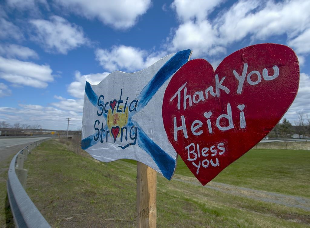 A memorial pays tribute to RCMP Const. Heidi Stevenson, a 23-year member of the force and mother of two, along the highway in Shubenacadie, N.S., on Thursday, May 14, 2020. THE CANADIAN PRESS/Andrew Vaughan
