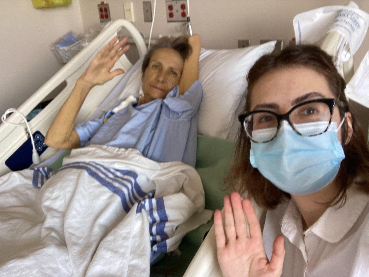 Kateryna Kuznetsova (left) and her daughter, Iryna, after she was admitted to hospital following her escape from Mariupol.