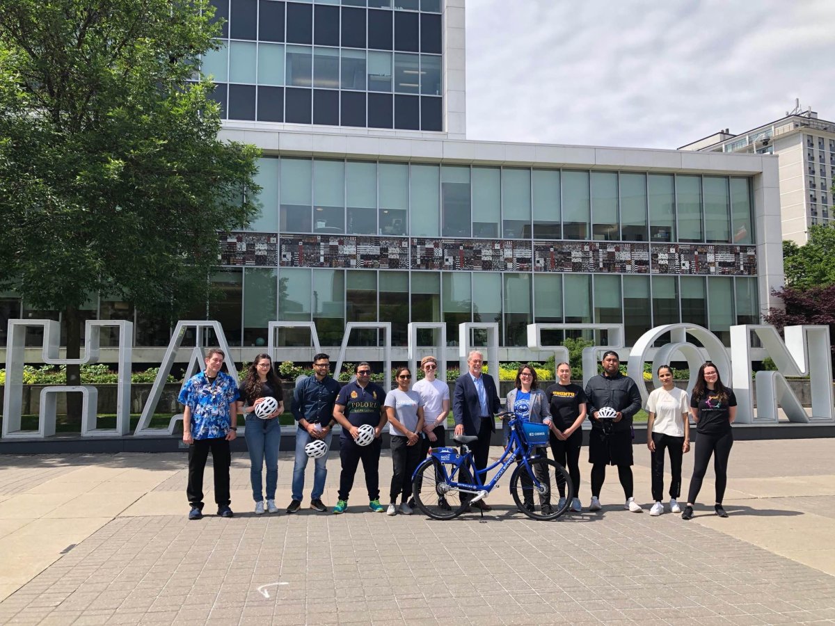 Amazon Canada employees were joined by Mayor Fred Eisenberger as they presented a cheque to Hamilton Bike Share on Monday morning.