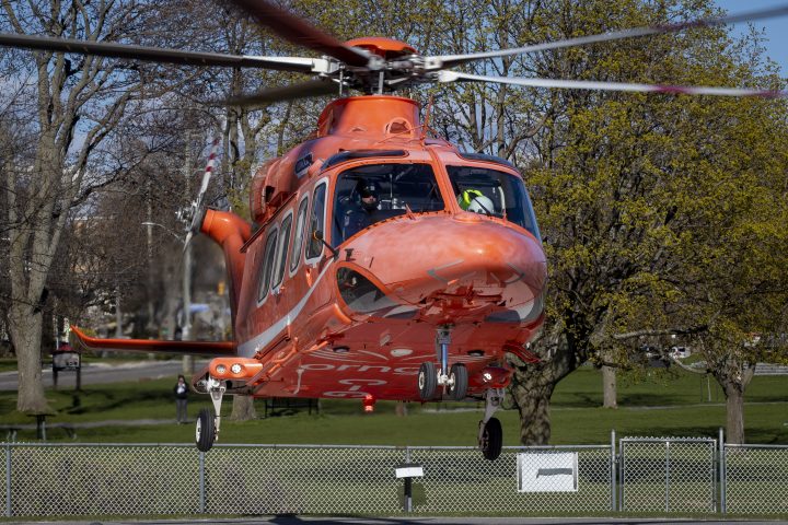 Ornge air ambulance C-GYNH takes-off from the helipad outside the Kingston general hospital in Kingston, Ontario on Sunday April 25, 2021. 