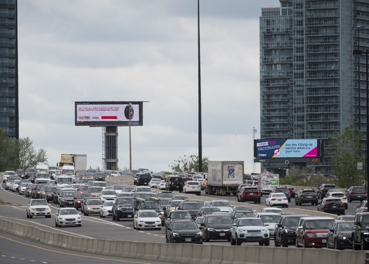Vehicles drive along the Gardiner Expressway in Toronto on Saturday, May 22, 2021.