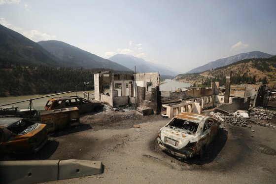 Damaged structures and vehicles are seen in Lytton, B.C., on Friday, July 9, 2021, after a wildfire destroyed most of the village on June 30.