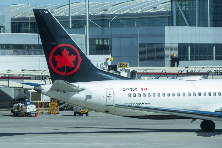 An Air Canada plane stands on the tarmac at Toronto Pearson airport in Toronto, Ontario on Tuesday March 29, 2022. 