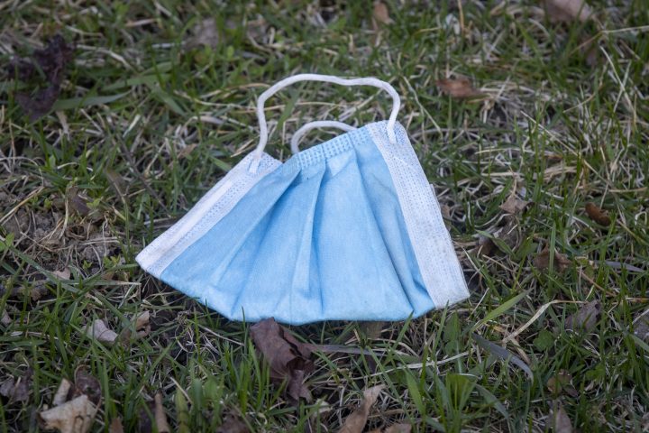 A discarded surgical mask in a park in Kingston, Ontario