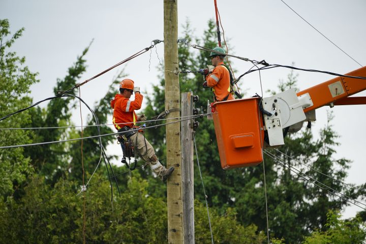 Hydro crews work to restore power in Clarence-Rockland, Ont., where a state of emergency is in place on Thursday, May 26, 2022. A major storm hit parts of Ontario and Quebec on Saturday, May 21, 2022, killing 11 people and leaving extensive damage to infrastructure, homes, and business. 