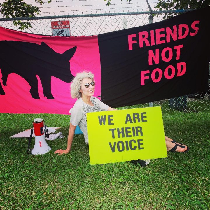 Regan Russell is shown protesting outside Fearmans Pork in Burlington, Ont., in this undated handout photo. On Father's Day, Mark Powell donated a bench to honour his late wife, Regan Russell, at an animal sanctuary north of Toronto. 