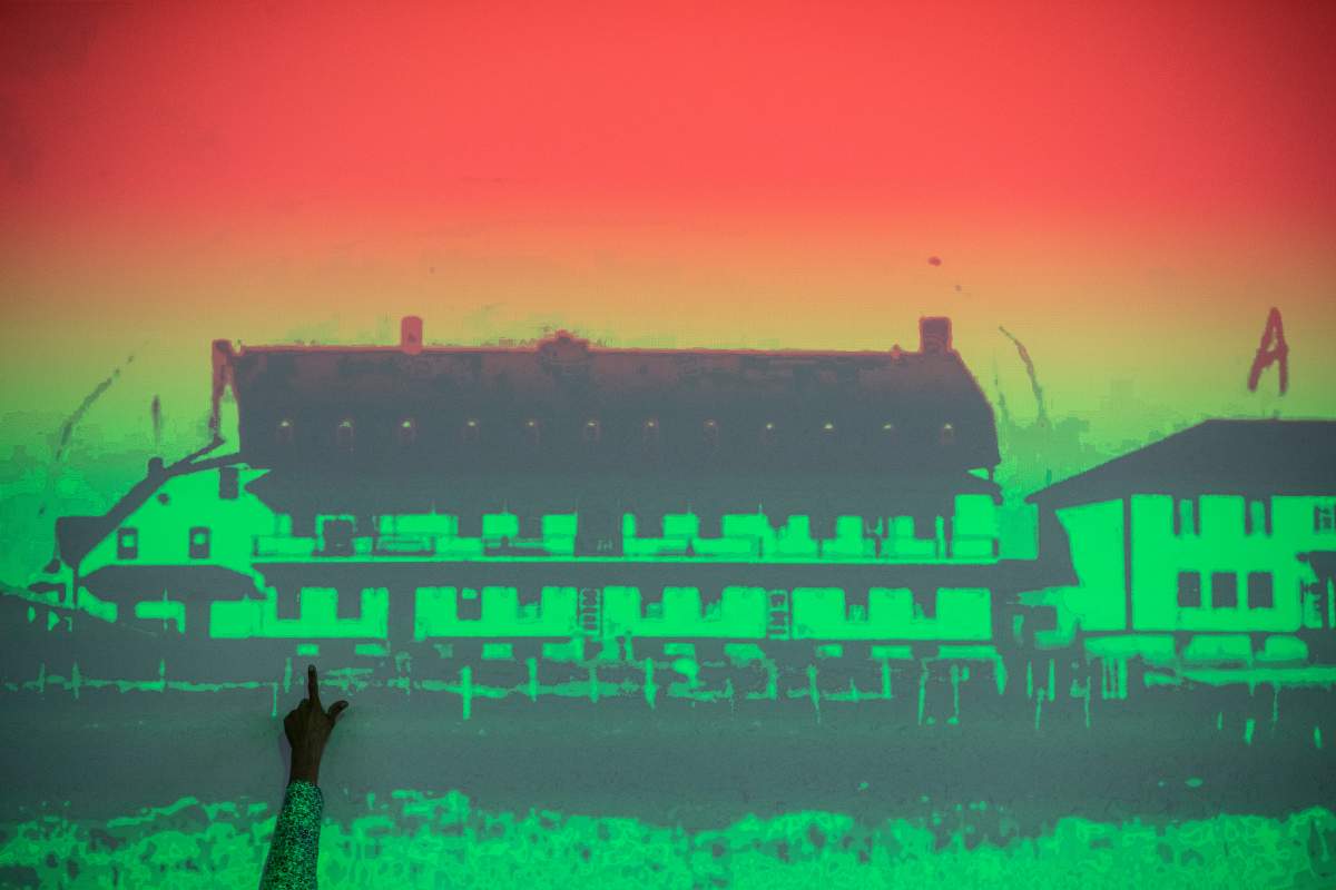 Chief Randy Ermineskin points to a residential school before speaking about the announcement from the Vatican of the Papal visit, in Maskwacis Alta, on Monday, June 27, 2022.