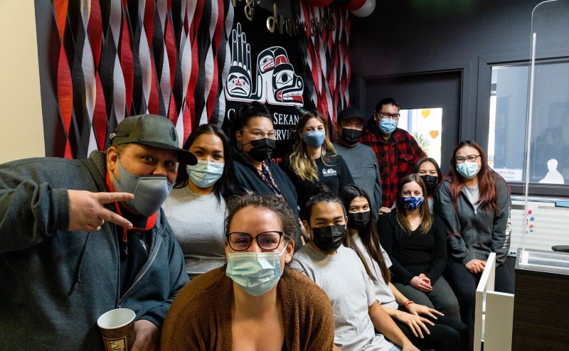 Staff at the Carrier Sekani Family Service's Sk’ai Zeh Yah Youth Centre in Prince George, B.C. pose for a quick photo during the COVID-19 pandemic.