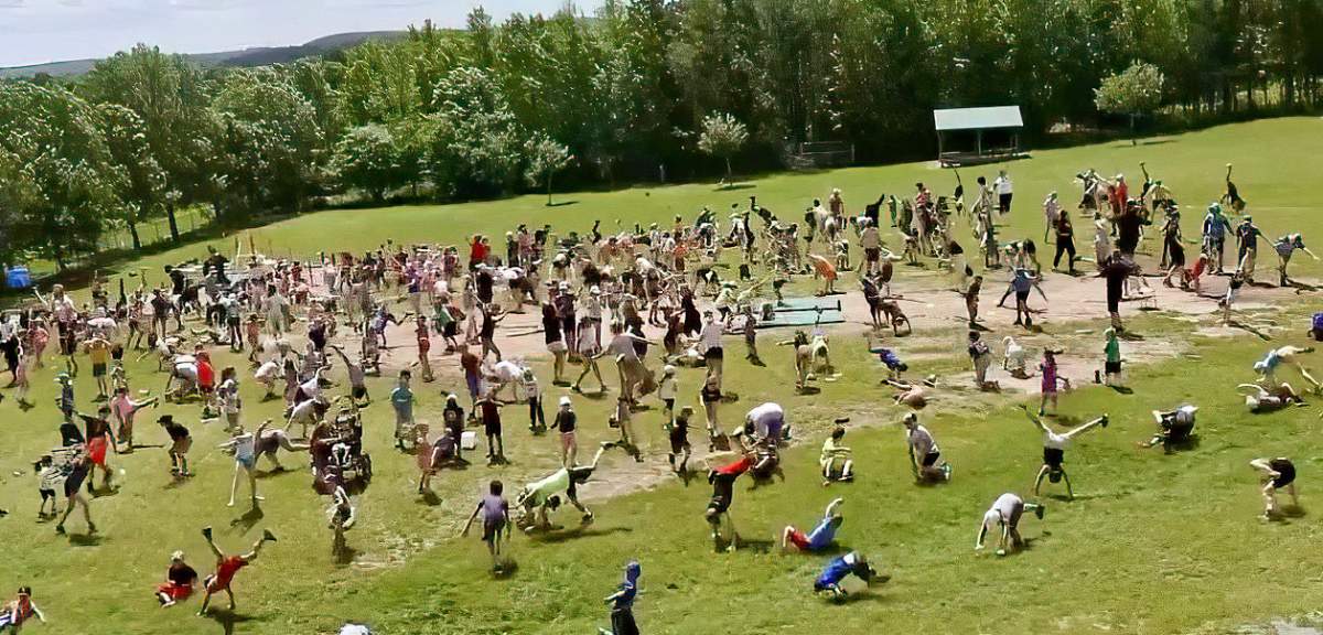 Students at St. Martin Catholic Elementary School in Ennismore compete in the cartwheel challenge.