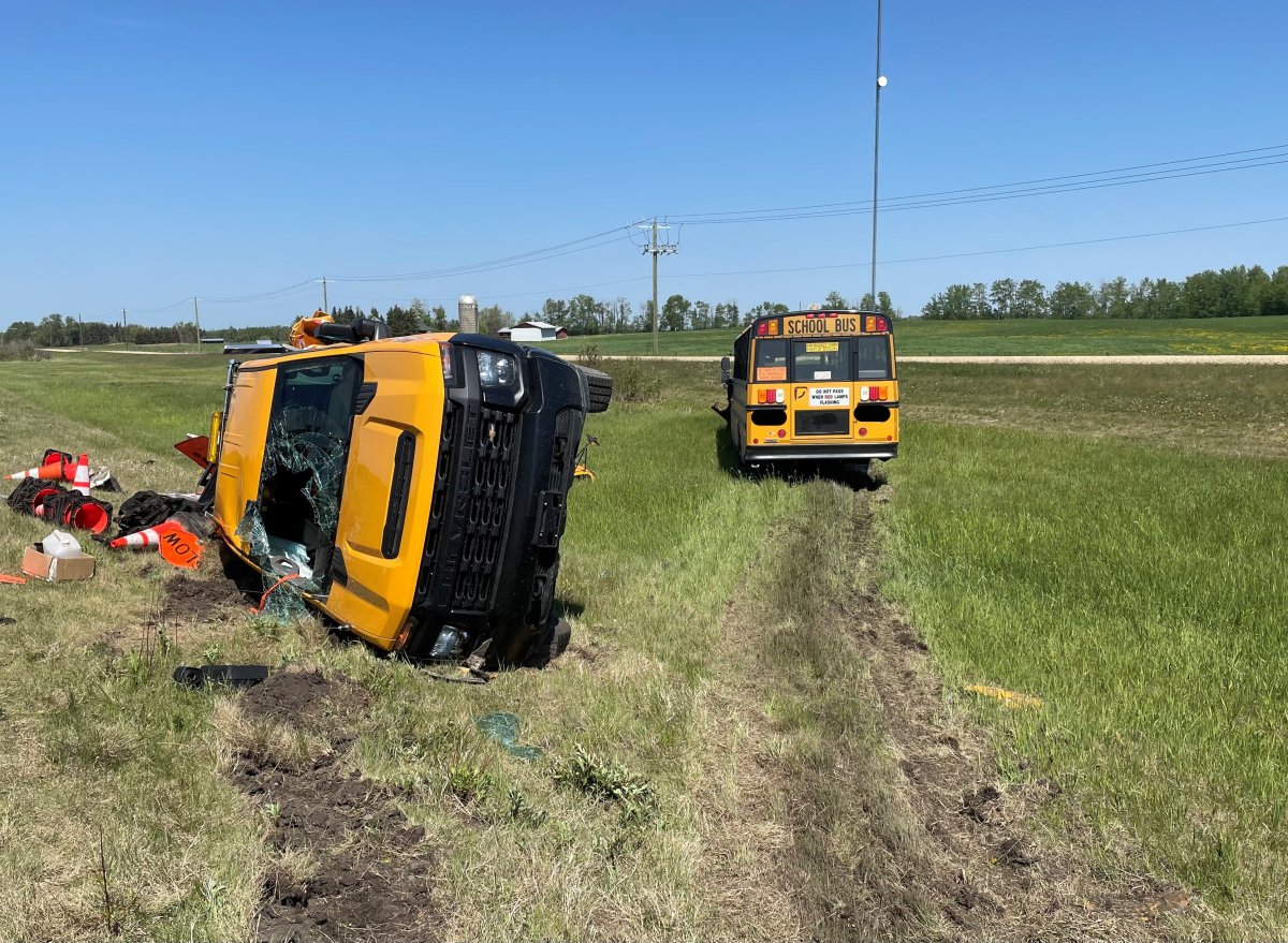 The aftermath of a collision involving a stolen school bus and a construction site west of Edmonton on Highway 43, pictured on June 3, 2022.