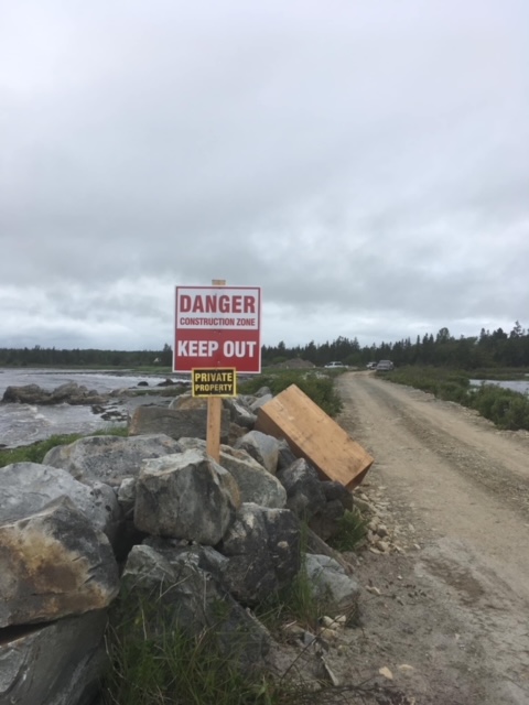 People are being told to keep off of a road that leads to Eagle Head Beach.