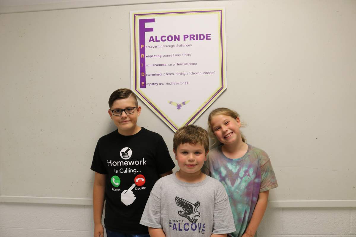 From Left to right F.D. Roosevelt Public School in London Ontario students Liam Ruck, Trevor Barrett, and Alyssa Barrett on the last day of the school year June 29, 2022